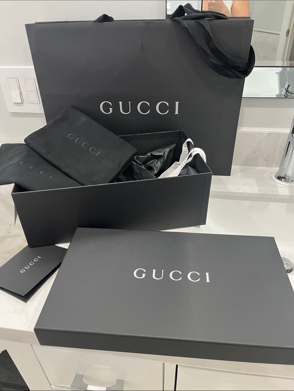 Gucci packaging — likely eyewear or shoes